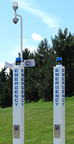 Two call boxes with big blue letters saying Emergency on them