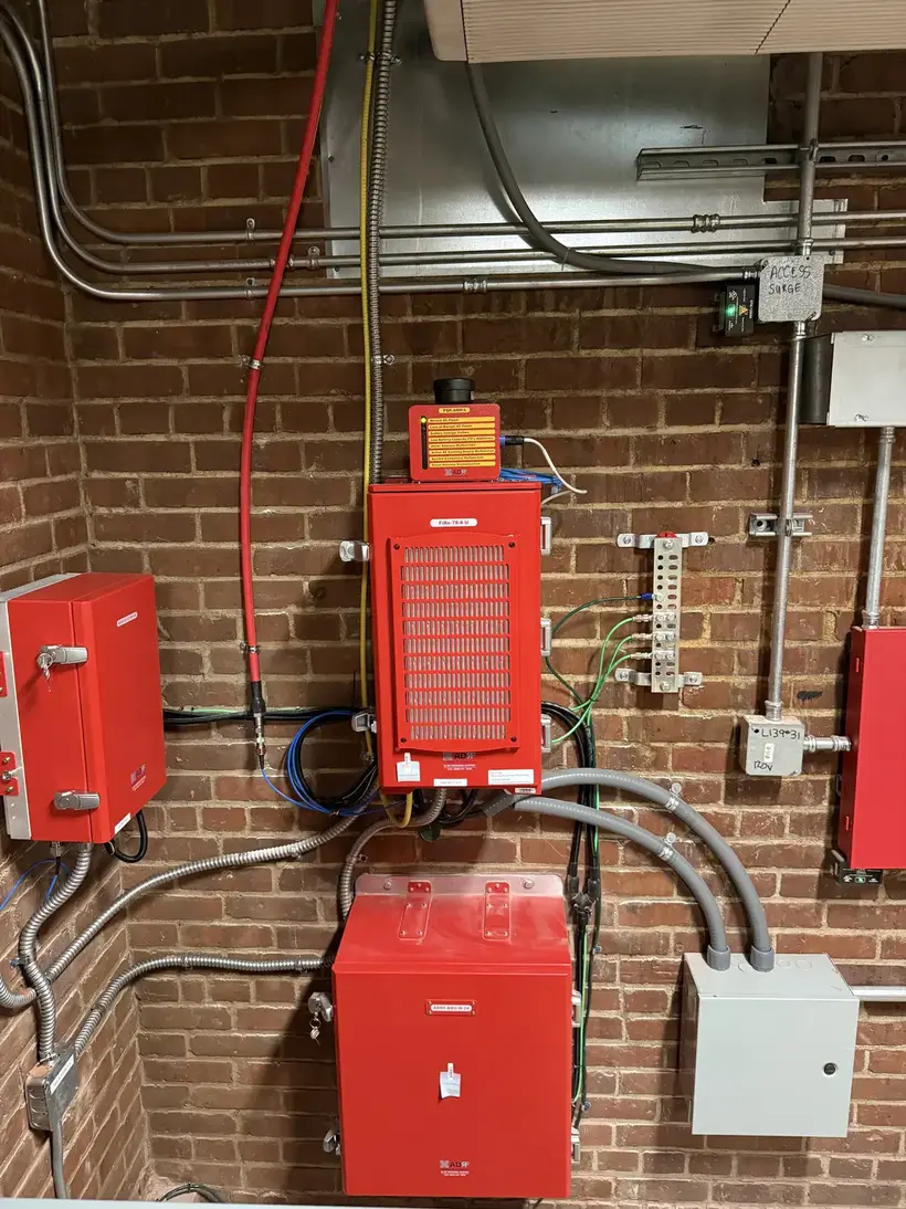 ADRF fiber BDA system with battery backup installed on a brick wall